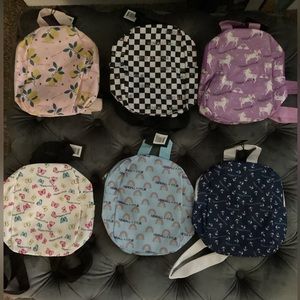 NWT. 6 Kendall & Kylie mini backpacks.